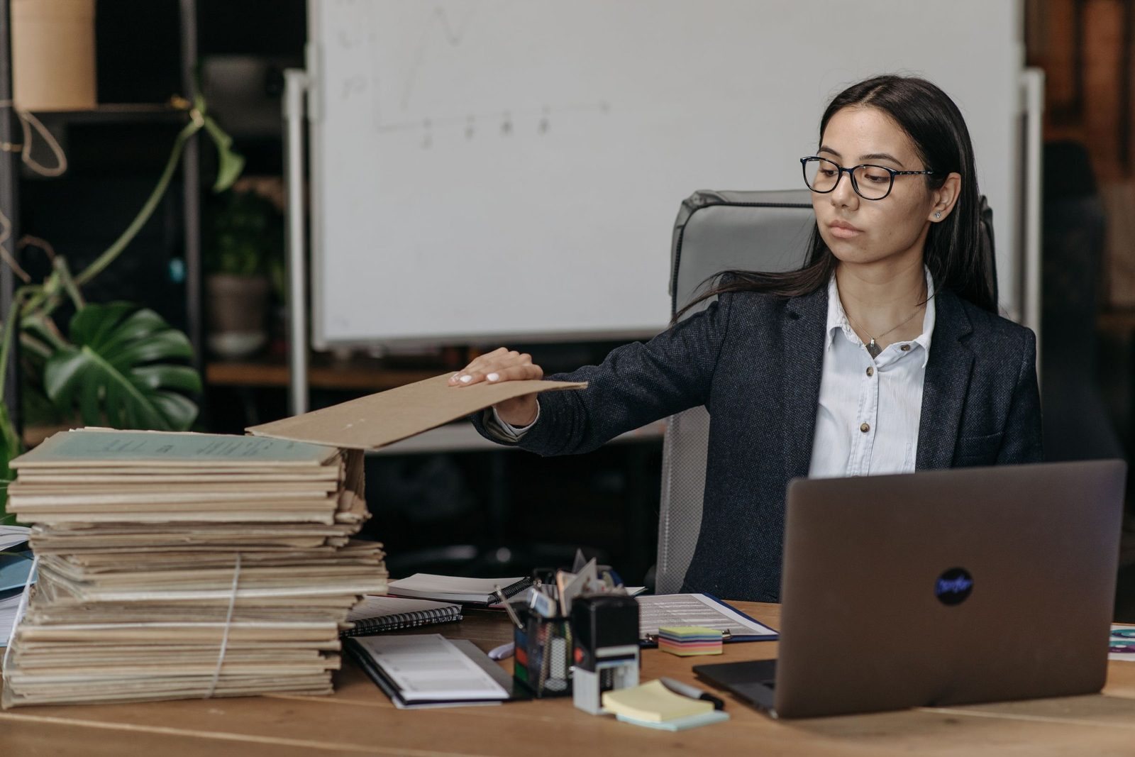 An administrator filing paperwork