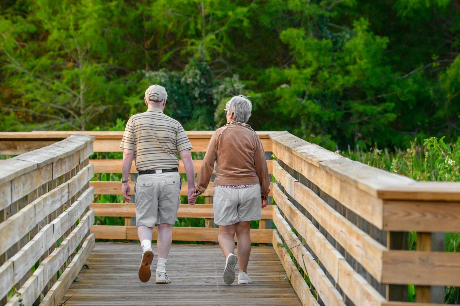 A retired couple walking together