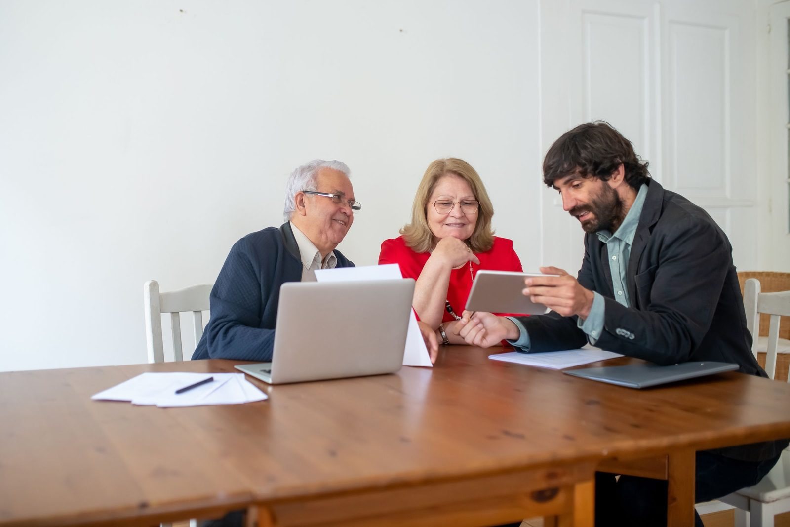 An adviser reviewing a portfolio with clients